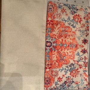 Three matching bright pillow cases.